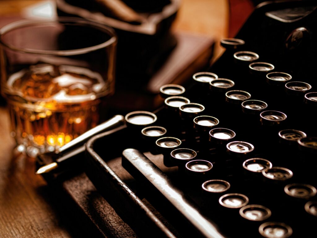Writer's night with a glass of whiskey